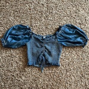 Denim off the shoulder crop top. Size: S